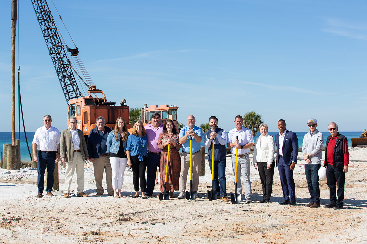 Margaritaville Beach Cottage Resort Groundbreaking group photo with gulf in the background
